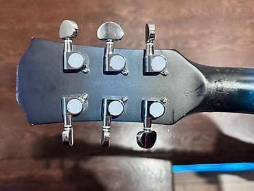 Комузы: Акустическая гитара Kabat, форма дредноут с вырезом (cutaway). Есть — 5