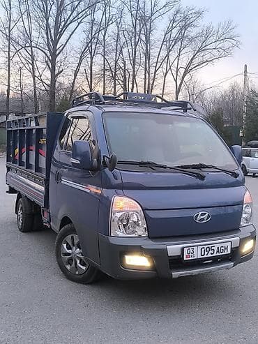 надпись гибрид: Легкий грузовик, Hyundai — 1