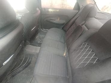Mazda 323: 1996 г., 1.8 л, Механика, Бензин, Седан — 6