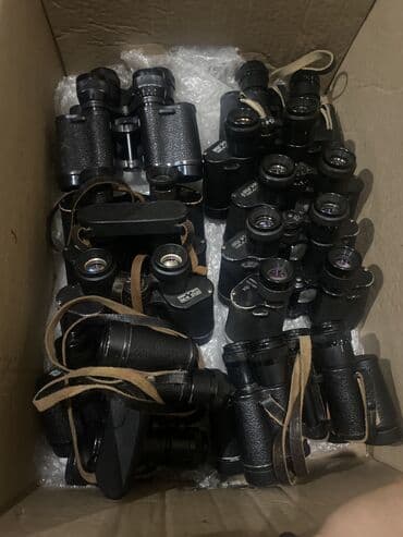 сумка для документов: Бинокль с черным корпусом и ремешком для удобства ношения. Оснащен — 6