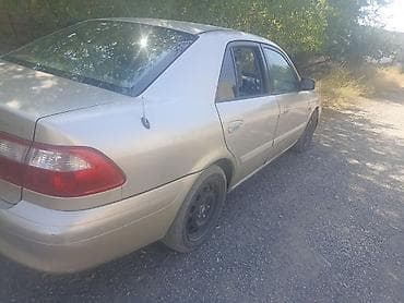 kia pegas: Mazda 323: 2001 г., 1.8 л, Механика, Седан — 1