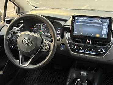 Продажа авто: Toyota Corolla: 2019 г., 1.8 л, Вариатор, Гибрид, Седан — 5