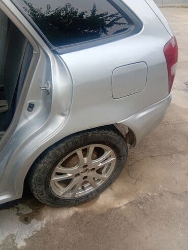 автомобиль бу: Mazda 323: 2003 г., 1.3 л, Механика, Бензин, Хетчбек — 12