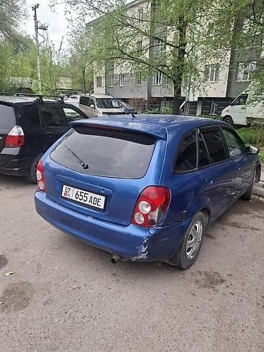 Mazda 323: 2002 г., 1.6 л, Автомат, Бензин, Универсал