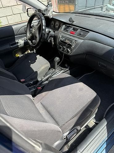 daewoo nexi: Mitsubishi Lancer: 2006 г., 1.6 л, Автомат, Бензин, Седан — 5