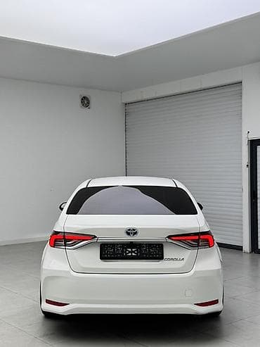 corolla 2016: Toyota Corolla: 2021 г., 1.8 л, Гибрид, Седан — 6