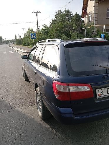 Транспорт: Mazda Capella: 2000 г., Механика, Универсал — 4