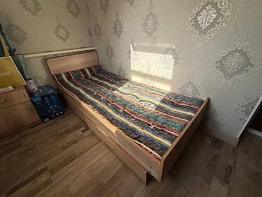 Односпальная кровать с выкатным ящиком для хранения. - Формат