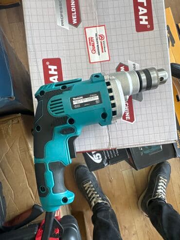 дрель ударная: Две дрели для различных задач. Первая – ударная дрель «Зубр» — 3