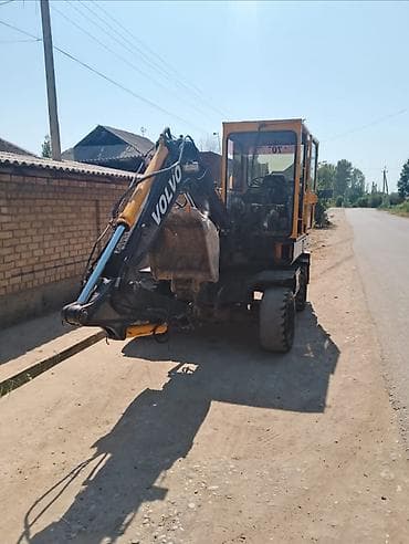 саб для воды: Экскаватор, Volvo, 2002 г., Колесный — 1