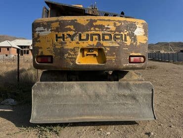 покрышка на погрузчик цена: Экскаватор, Колесный — 9