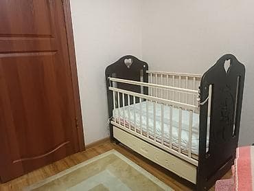 Детская мебель: Детская кроватка с маятниковым механизмом и ящиком для хранения — 2