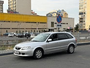 launch 431: Mazda 323: 2003 г., 1.6 л, Механика, Бензин, Универсал — 1