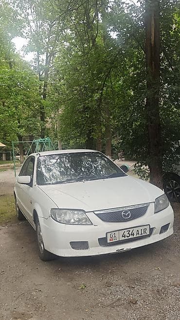 mazda 623: Mazda Familia: 2003 г., Бензин, Седан — 2