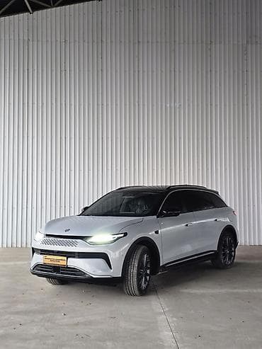 детский костюм тёплый на зиму: Электромобиль LEAPMOTOR — интерьер и мультимедиа премиум-класса — 7