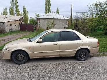 step 2: Mazda 323: 2001 г., 1.6 л, Автомат, Бензин, Седан — 2