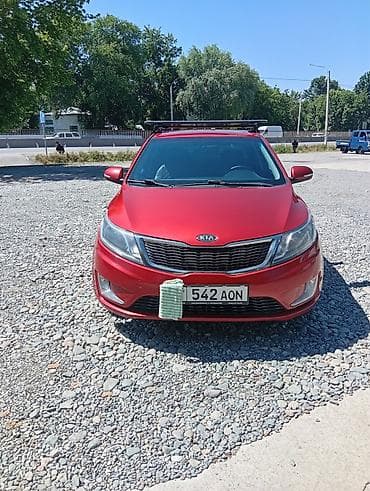 кызыл кия кыз: Kia Rio: 2012 г., 1.6 л, Кол менен иштөөчү, Бензин, Седан — 1
