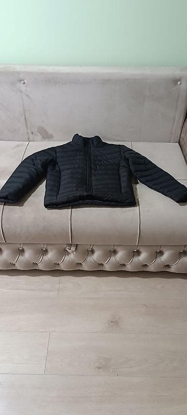 Оюнчуктар: Утеплённая куртка-пуховик для детей/подростков, чёрного цвета — 1