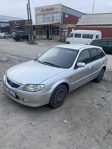 180 sx: Mazda 323: 2002 г., 1.6 л, Механика, Бензин, Хэтчбэк — 2
