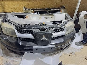 подкрылки митцубиси аутлендер 2010г: Ноускат Mitsubishi, 2003 г., Б/у, Оригинал — 1