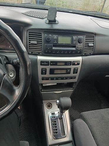 Toyota Corolla: 2004 г., Автомат, Бензин, Универсал — 4