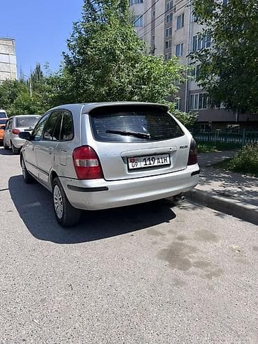 сузики вагон: Mazda 323: 2000 г., 1.6 л, Механика, Бензин, Универсал — 10
