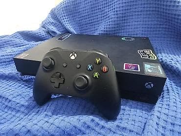 самый дешёвый xbox: Xbox One X, 1 ТБ. Комплект: консоль, 1 оригинальный беспроводной — 3