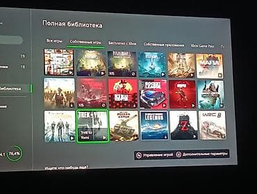 Игровая консоль Xbox One X (1 ТБ) с двумя беспроводными геймпадами
