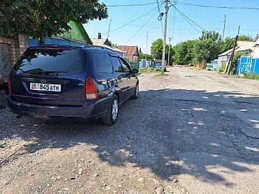 x treil: Ford Focus: 2001 г., 1.6 л, Механика, Газ, Универсал — 4