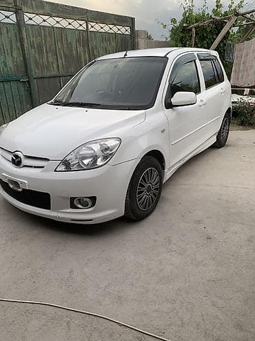black edition: Mazda Demio: 2004 г., Хэтчбэк — 2