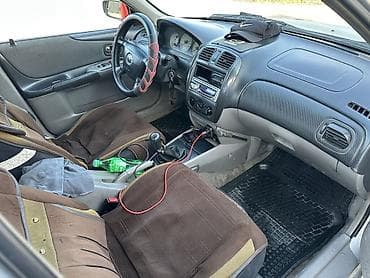 handa jazz: Mazda 323: 2002 г., 1.6 л, Механика, Бензин, Седан — 7