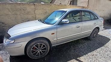 Mazda 626: 1999 г., 1.8 л, Механика, Бензин, Лифтбек