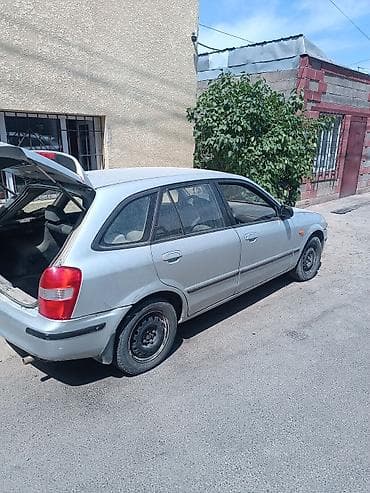 Продажа авто: Mazda 323: 1999 г., 1.6 л, Автомат, Бензин, Хэтчбэк — 3