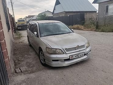 chek it: Mitsubishi Lancer: 2001 г., 2 л, Автомат, Бензин, Универсал — 1