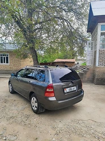 2 8: Toyota Corolla: 2003 г., 1.6 л, Механика, Бензин, Универсал — 1