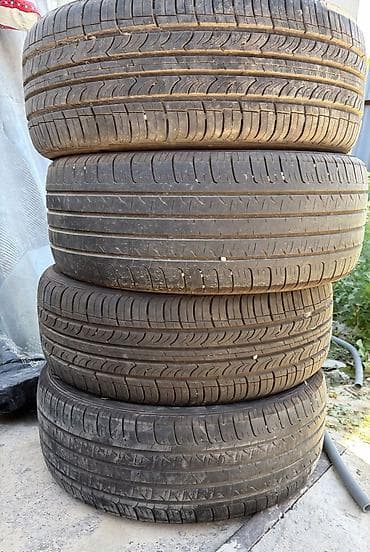 Комплект из 4 летних шин P215/55 R17 94V. - Тип: летние, дорожный