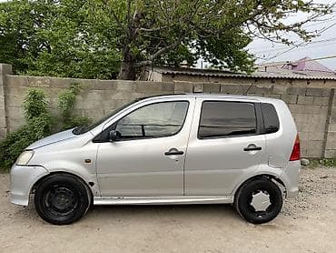 mazda 121: Daihatsu YRV: 2002 г. — 8