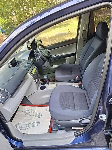 б в: Mazda Demio: 2004 г., 1.3 л, Автомат, Бензин, Хэтчбэк — 9