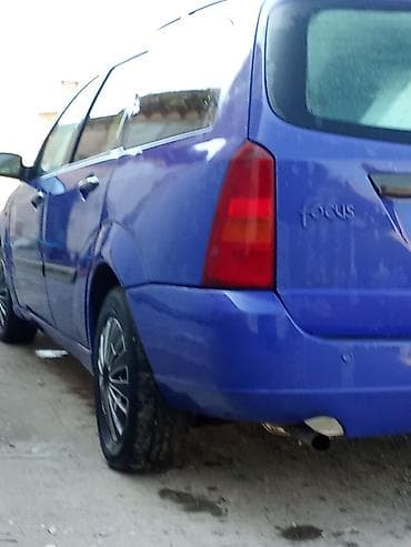 авто выхлоп: Ford Focus: 2000 г., Механика — 5