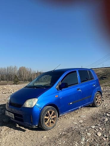 golf 2: Daihatsu Cuore: 2003 г., Автомат, Бензин, Хэтчбэк — 3