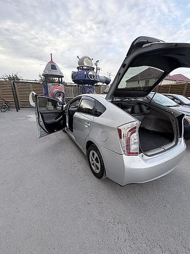 byd e2 2023: Toyota Prius: 2013 г., Автомат, Гибрид, Хэтчбэк — 5