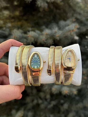 запястье: Женские часы-браслеты Bulgari Serpenti (пара) - Формат: часы-манжет с — 1