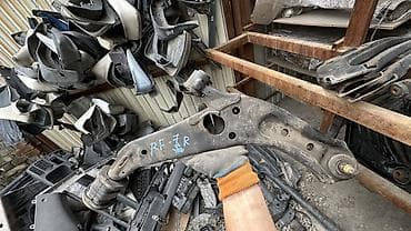 Передний правый рычаг Honda
