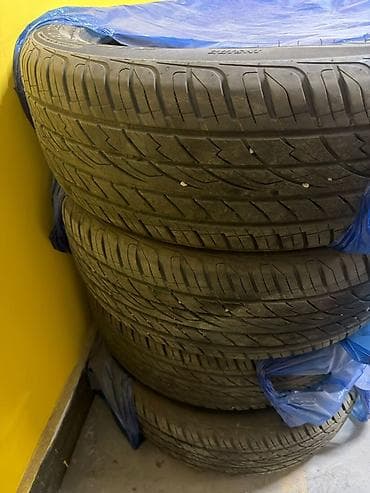 Комплект из 4 летних шин 235/55 R20 105W. Характеристики: - Тип