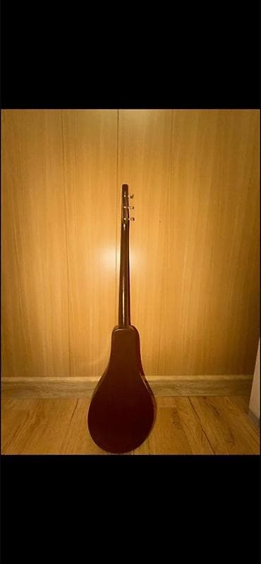 Музыкалык аспаптар: Казахский домбра (двухструнная), с чехлом. - Корпус каплевидной — 2