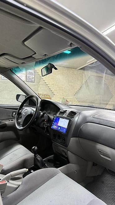 вместе дешевле: Mazda 323: 2001 г., 1.6 л, Механика, Бензин, Универсал — 6