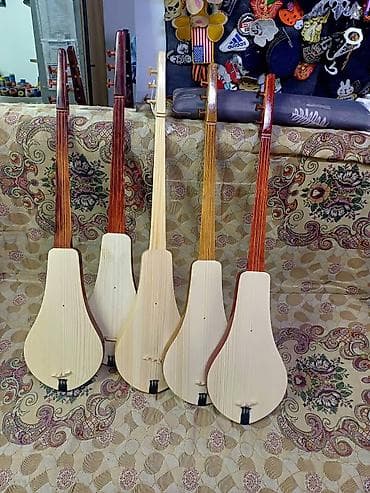 Баяны: Өрүктөн (15 миң), карагайдан (4 миң) жасалган комуздар сатылат — 3