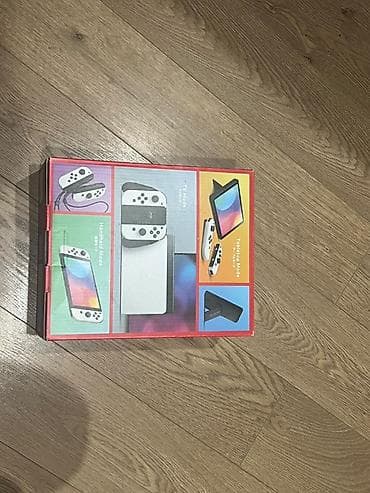 Nintendo Switch OLED: Nintendo Switch OLED (модель HEG-001) — белая версия Комплектация по — 6