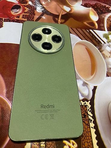 телефон редми 14 про: Смартфон Redmi14c памить 128г (зелёный) - Тыловая круглая камера с — 1