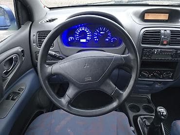 е34 4 4: Mitsubishi Space Star: 1999 г., Механика, Бензин — 10